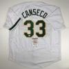 imageAutographedSigned Jose Canseco Oakland White Baseball Jersey JSA COA