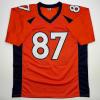 imageAutographedSigned Ed McCaffrey 2x SB Champs Denver Orange Football Jersey Beckett BAS COA