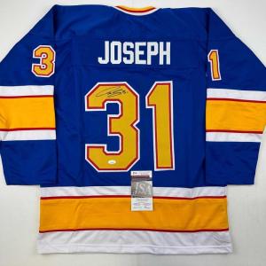 imageAutographedSigned Curtis Joseph St Louis Blue Hockey Jersey JSA COA