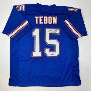 imageAutographedSigned Tim Tebow Florida Blue College Football Jersey Beckett BAS COA