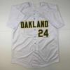 imageAutographedSigned Rickey Henderson Oakland White Baseball Jersey Beckett BAS COA