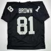 imageFacsimile Autographed Tim Brown Oakland Las Vegas Black Reprint Laser Auto Football Jersey Size Mens XL