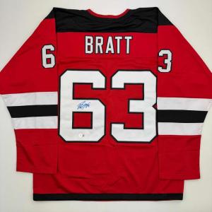 imageAutographedSigned Jesper Bratt New Jersey Red Hockey Jersey Beckett BAS COA