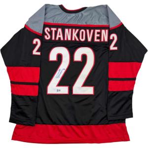 imageAutographedSigned Logan Stankoven Carolina Black Hockey Jersey Beckett BAS COA