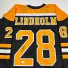 imageAutographedSigned Elias Lindholm Boston Black Hockey Jersey JSA COA