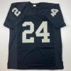 imageFacsimile Autographed Charles Woodson Oakland Las Vegas Black Reprint Laser Auto Football Jersey Size Mens XL