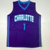 imageAutographedSigned Muggsy Bogues Charlotte Purple Modern Basketball Jersey Beckett BAS COA
