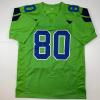 imageAutographedSigned Steve Largent Seattle Green Football Jersey PSADNA COA