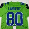 imageAutographedSigned Steve Largent Seattle Green Football Jersey PSADNA COA