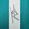 imageAutographedSigned Travis Etienne Jr Jacksonville Teal Football Jersey Beckett BAS COA
