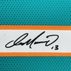 image:imageFramed Facsimile Autographed Dan Marino 35x39 Miami Teal Reprint Laser Auto Football Jersey