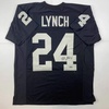 image:imageFacsimile Autographed Marshawn Lynch Oakland Las Vegas Black Reprint Laser Auto Football Jersey Size Mens XL